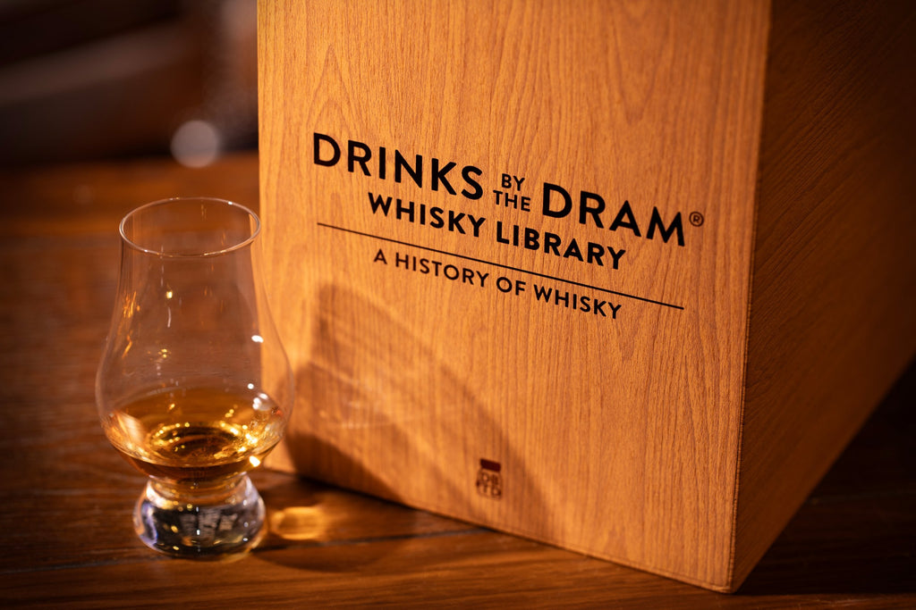 Drinks by the Dram Whisky Library box with a glass of whisky