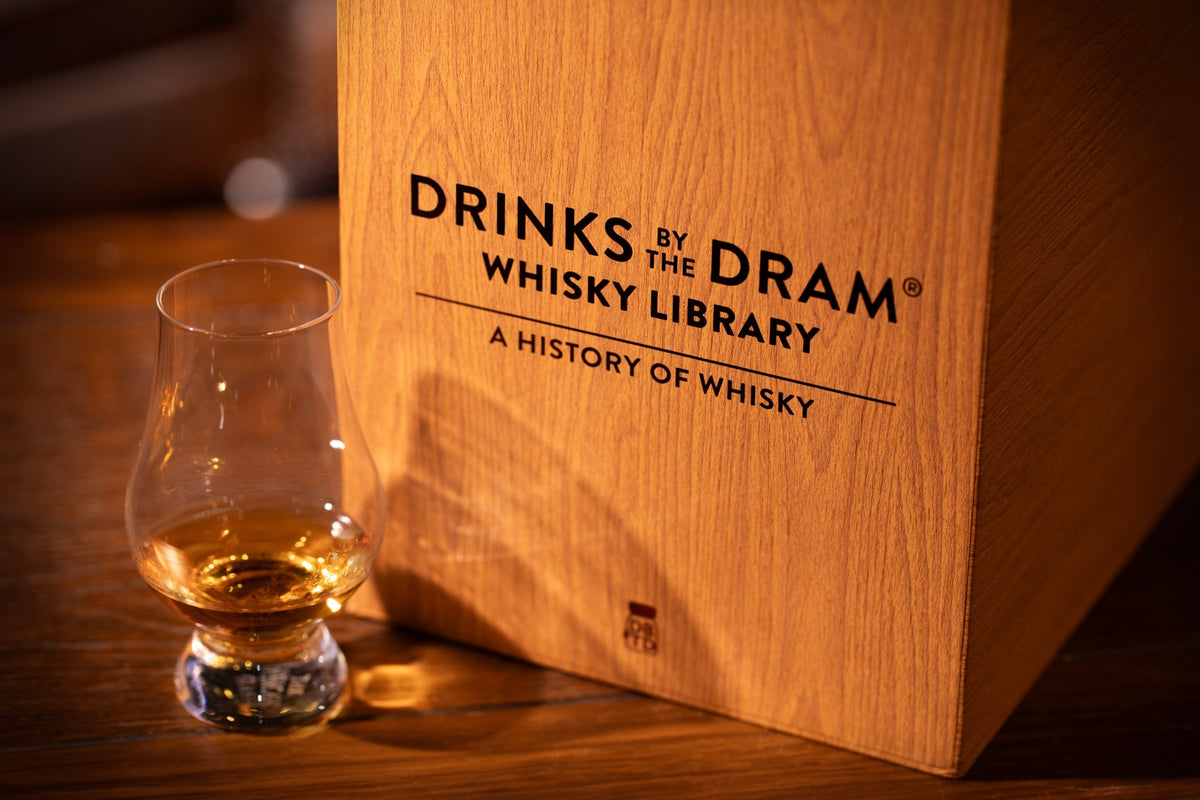 Drinks by the Dram Whisky Library box with a glass of whisky
