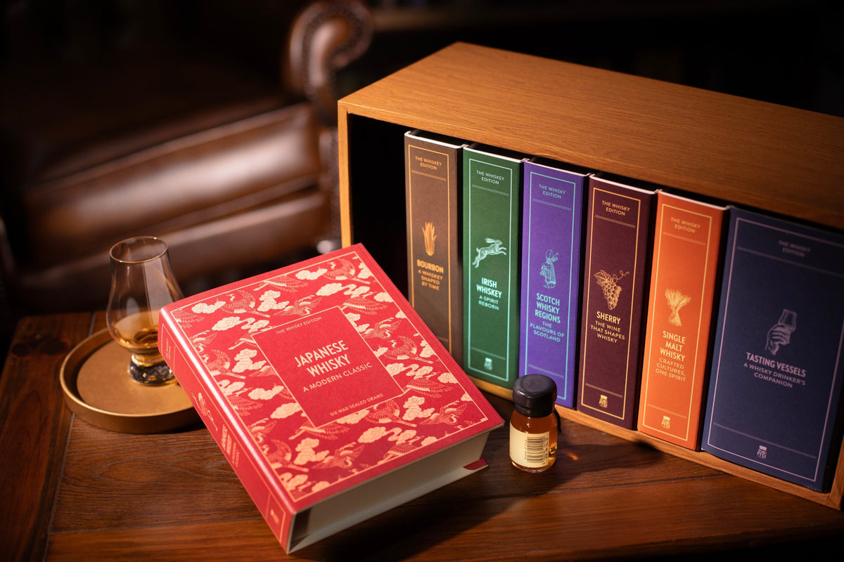 Japanese Whisky book in front of the Dramthology shelf