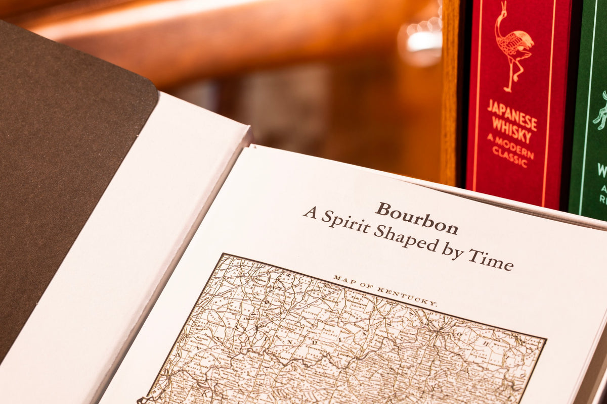 Bourbon book open at a map of Kentucky